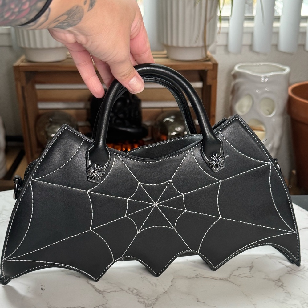 Bat cross body bag